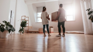 Young couple moving into new home